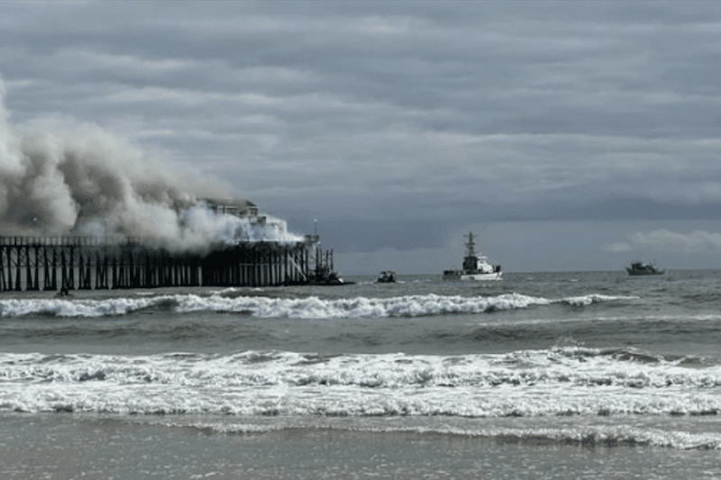 Beloved Oceanside pier engulfed in flames while surfers bob and weep